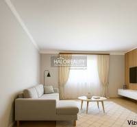 Nappali egy családi házban, fa mintázatú padlóval és világos bútorokkal.