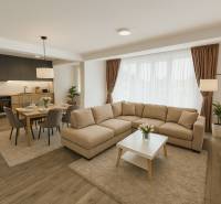 Nappali konyhával és fa dekor padlóval egy családi házban.