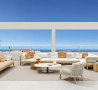 A torreviejai nyaraló apartman terasza ülőhellyel, háttérben az óceán és a kék ég.