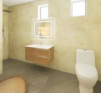 Fürdőszoba családi házban mosógéppel, zuhanyzóval és mosdóval, fa mintázatú padlóval.