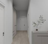 Egy családi ház folyosója fa dekoros padlóval és egyszerű bútorokkal.