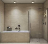 Fürdőszoba családi házban káddal és üveg zuhanykabinnal, bézs csempével körülvéve.