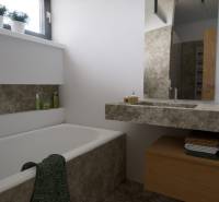 Fürdőszoba káddal és mosdóval, természetes dekorokkal és tárolóhellyel körülvéve.