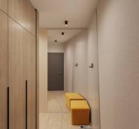 Egy épület belső tere fa dekor padlóval, ruhásszekrény, tükör és sárga ülőhely.