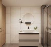 Fürdőszoba tükörrel, modern mosdókagylóval és fa elemekkel a tárolószekrényeken.