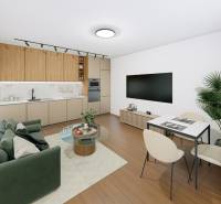 Nappali konyhasarokkal egy kétszobás lakásban, fa mintázatú padlóval.