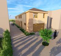 Kétszintes épület a Litoměřicei úton Topoľčiankyban, környező fákkal.