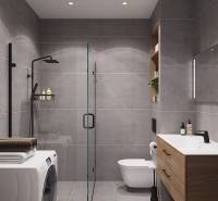 Fürdőszoba zuhanyzóval, mosdóval és mosógéppel egy egyszobás lakásban.