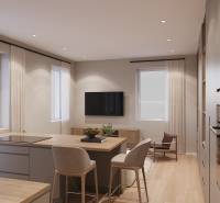 Egyszobás lakás egyszerű belső tere konyhával és nappali résszel, fa dekorációjú padlóval.