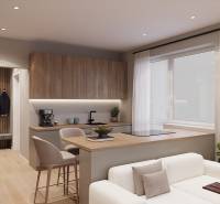 1 szobás lakás belső tere fa dekor padlóval és konyhasarokkal.