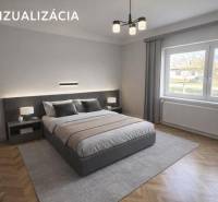 Hálószoba családi házban szőnyeg dekorációval és ággyal, nagy ablak kilátással.