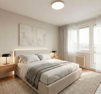 Hálószoba egy kétszobás lakásban nagy ággyal és fa dekoros padlóval.