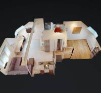 Iroda 3D modellje fa mintázatú padlóval és minimalista bútorokkal.