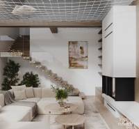 Világos nappali egy faházban kényelmes kanapéval és fa mintázatú padlóval.