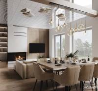 Egy étkezőasztallal, kandallóval és fa dekorációjú padlóval rendelkező ház belső tere, csillárokkal megvilágítva.