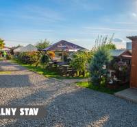 Developerský pozemok pre RD / OV so St. Povolením a projektom Obch. Budovy