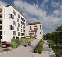 Új építés és zöldterület a poprádi Suchoňova utcában a 4 szobás lakás mellett.