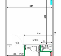 Garzonlakás alaprajza konyhával és fürdőszobával, amely mosógépet és WC-t tartalmaz.