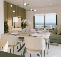 Étkező rész a tengerre néző rekreációs apartmanban elegáns terítékkel.