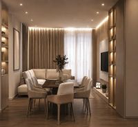 A rekreációs apartman belső tere kényelmes ülőhellyel, étkezőasztallal és fa dekorációjú padlóval.