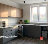 Konyha egy egyszobás lakásban fa dekor padlóval és konyhabútorral.