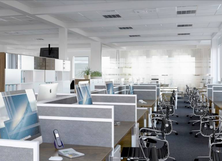 Irodák számítógépekkel és székekkel, fa dekorációjú padló és munkaterület.