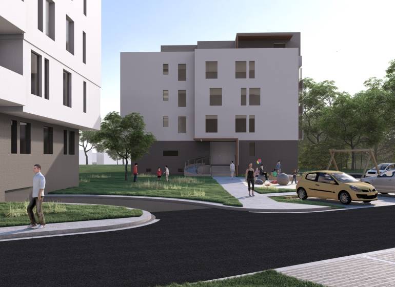 Épület Galántán, környék emberekkel, autókkal és játszótérrel, 2 szobás lakás kínálata.