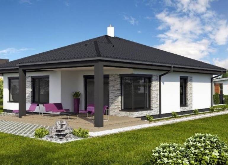 Családi ház Dunaszerdahely mellett terasszal, gyepfelülettel és kerti ülőhellyel.