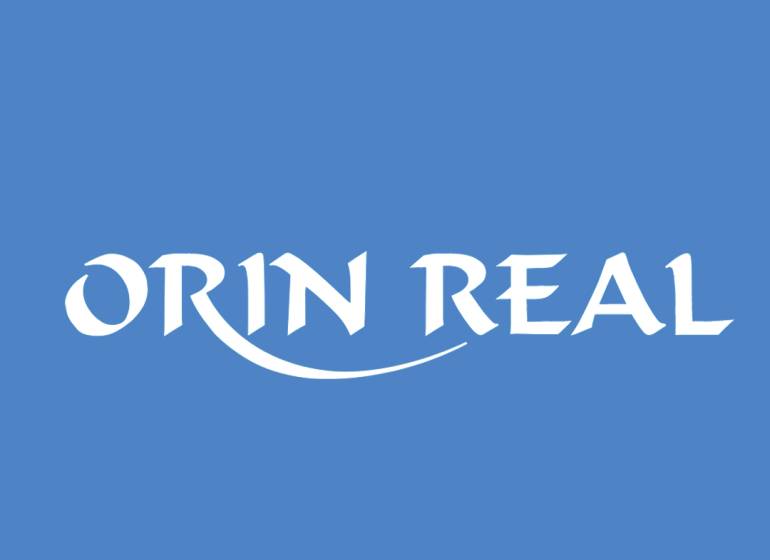 Kék logó ORIN REAL felirattal és a jobb sarokban hitelesített minőségi jelvénnyel.
