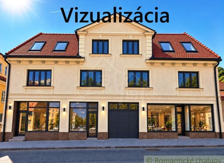 Az üzlethelyiségekkel rendelkező épület homlokzata Kékkő városában, amely üveg kirakatokat ábrázol.