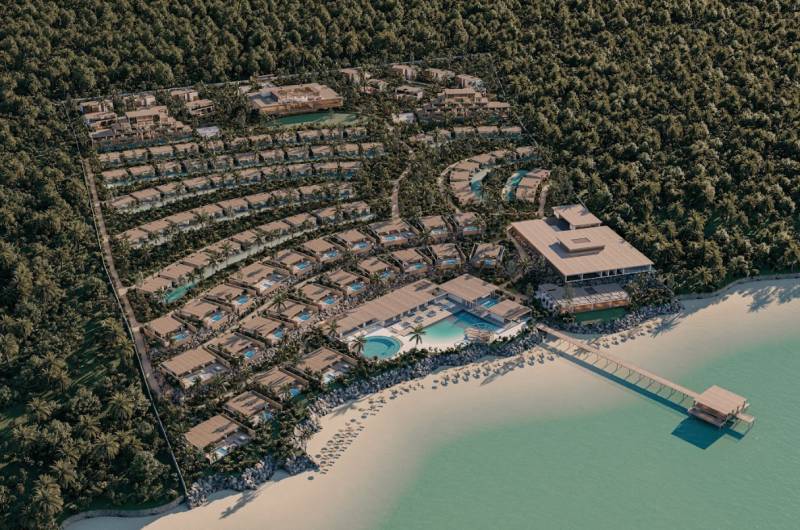 Luxusos lakónegyed villákkal és medencékkel a tengerparton, Nungwi részén, Zanzibar North.