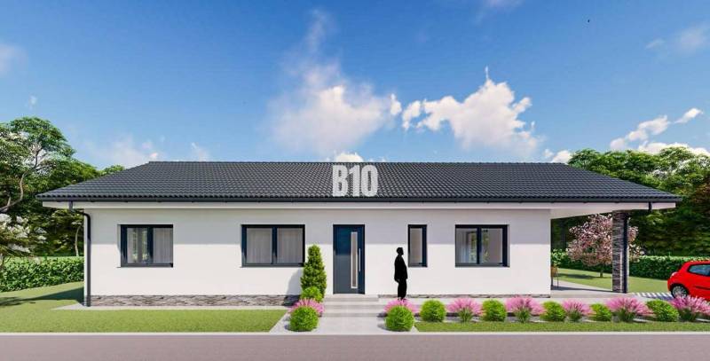 Családi ház Cséladiceben, lakóövezeti telkek, rendezett kerttel és felhajtóval.