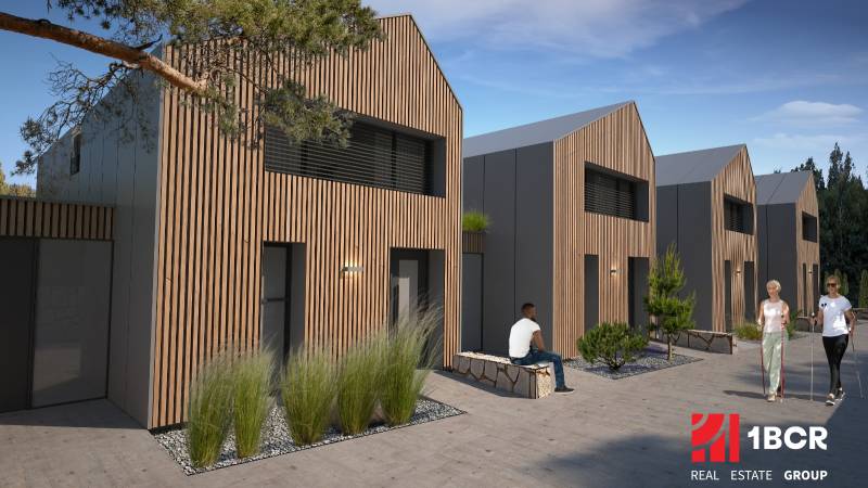 Családi ház Tureckejben fa burkolattal, emberek pihennek a padon.