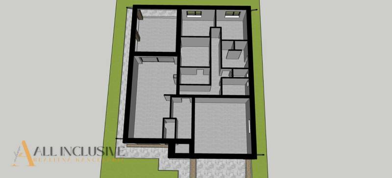 Bajcsi családi ház alaprajza a helyiségek elrendezésével és két ablakkal.