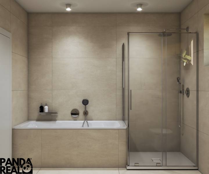 Fürdőszoba családi házban káddal és üveg zuhanykabinnal, bézs csempével körülvéve.