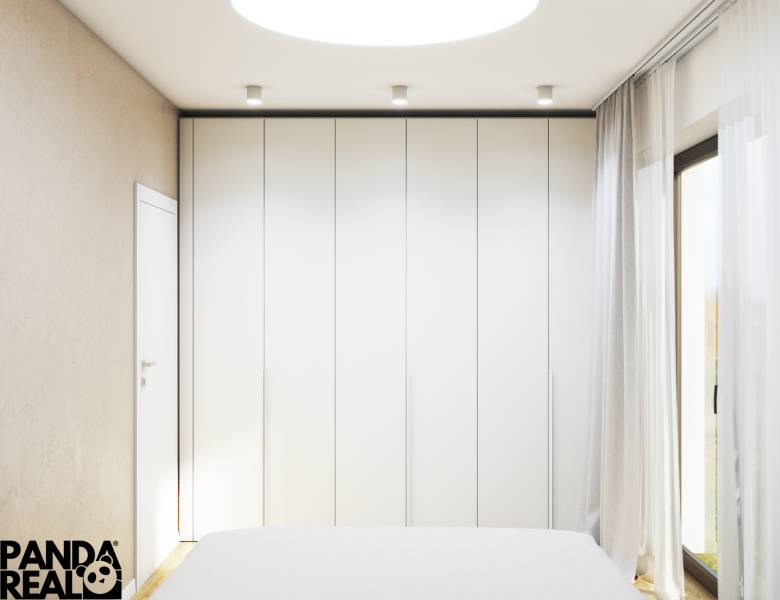 Fehér beépített szekrény a családi ház hálószobájában, fa dekor padlóval.