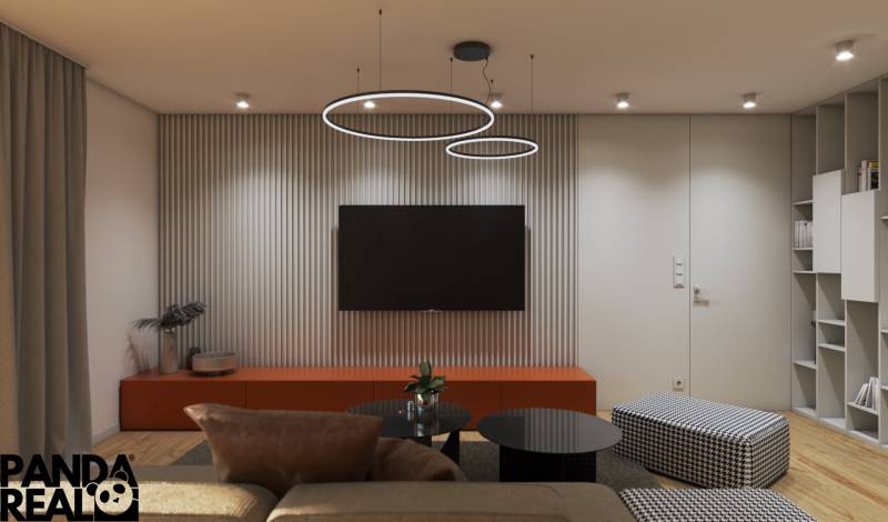 Nappali egy családi házban, fa dekorációjú padlóval és minimalista berendezéssel.