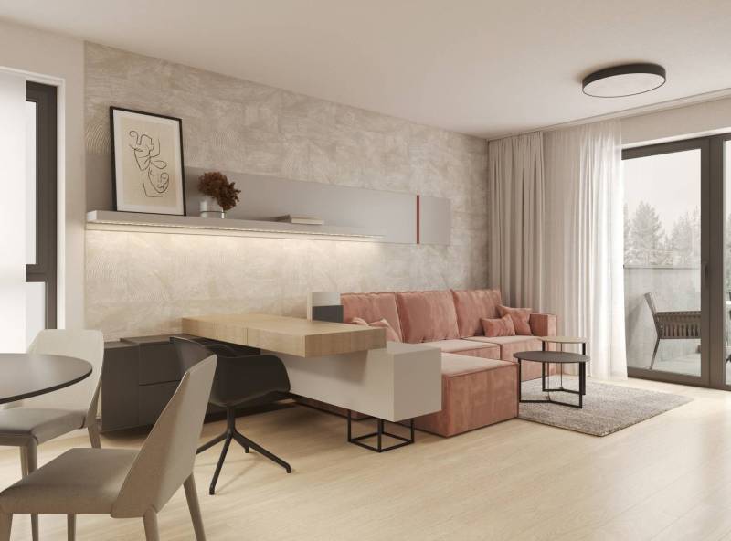 Nappali bézs színű fallal, rózsaszín kanapéval és fa dekorációjú padlóval.