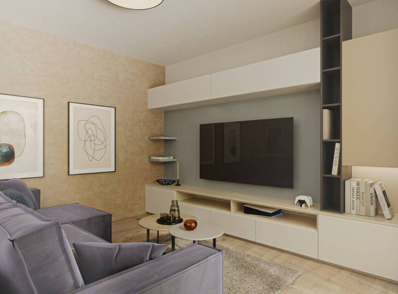 Nappali belső tér kényelmes kanapéval, televízióval, képekkel és fa dekorációjú padlóval.