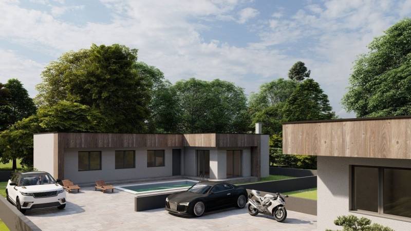 Családi ház Zsigárdon medencével, két autóval és egy motorral a kikövezett udvaron.