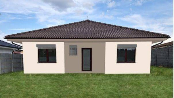 Családi ház Kolónián, Galántán, sötét tetővel és füves kerttel.