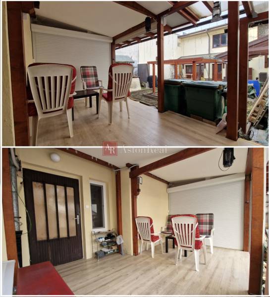 A Laborecká utcai családi ház kertje Iglón műanyag ülőgarnitúrával.