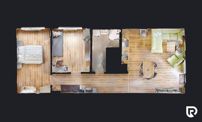 3 szobás lakás alaprajza fa dekor padlóval, konyhával és nappalival.