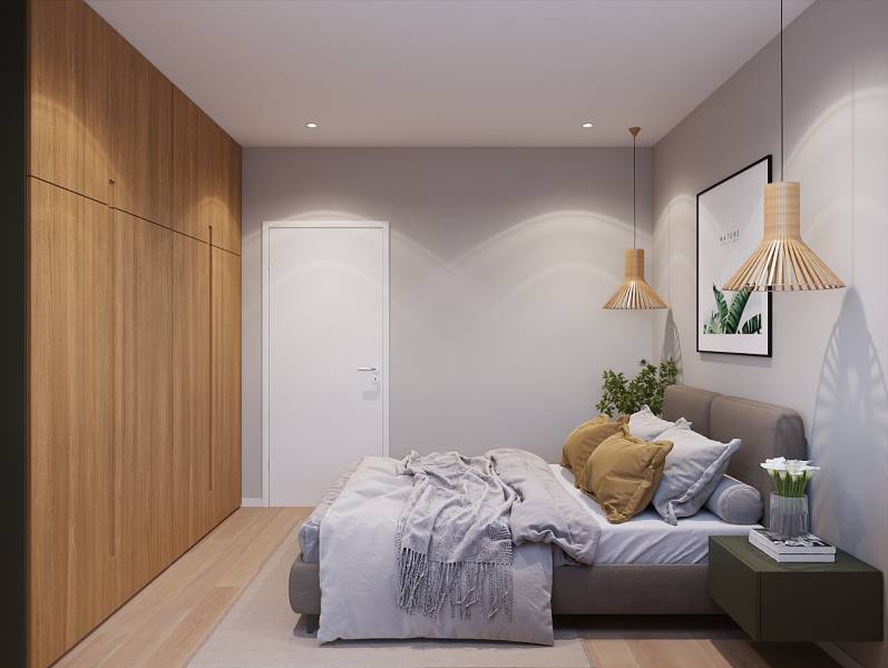 Hálószoba egy egyszobás lakásban ággyal, növénnyel és fa dekorációval a padlón.