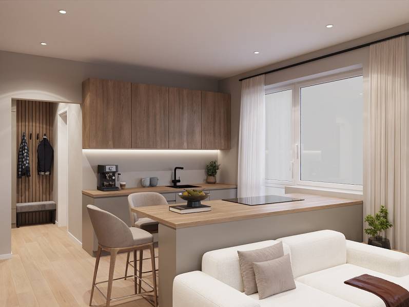 1 szobás lakás belső tere fa dekor padlóval és konyhasarokkal.