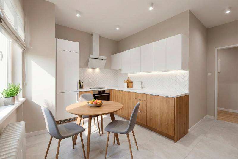 Konyha egy kétszobás lakásban fa dekor padlóval és modern készülékekkel.