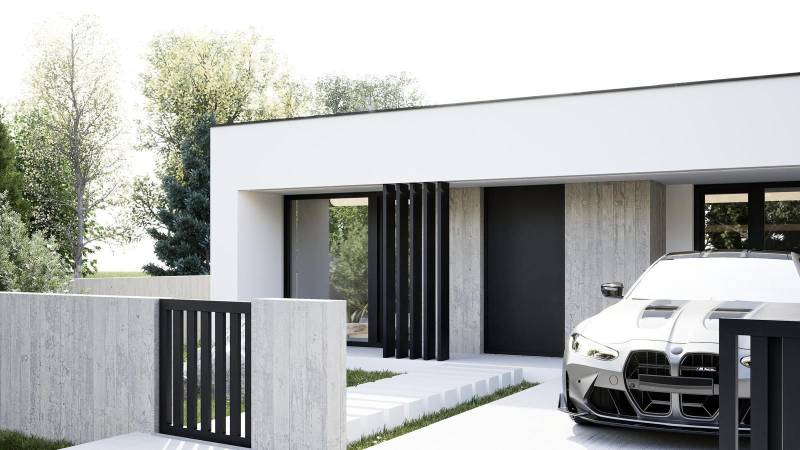 Egyszintes családi ház Nesvadyn, a felhajtón egy BMW autóval.