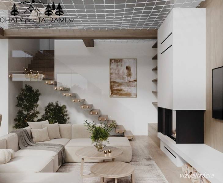 Világos nappali egy faházban kényelmes kanapéval és fa mintázatú padlóval.