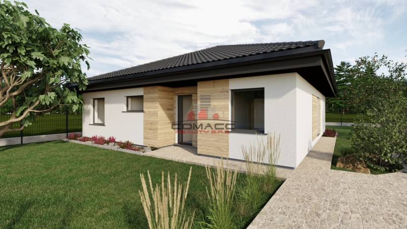 Családi ház a Drahovce-i Templom utcában, gyepesített és rendezett kerttel.