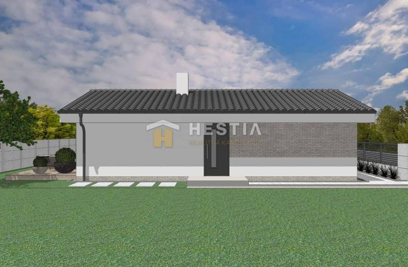 Modern homlokzatú és tetős családi ház, zölddel és rendezett kerttel körülvéve.